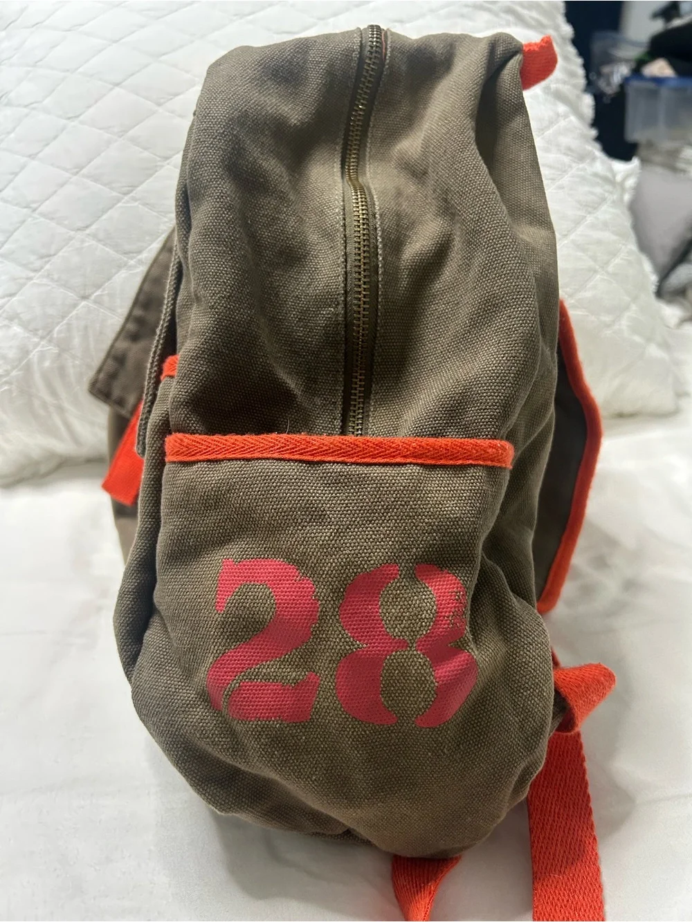 Unisex Canvas Backpack in Olive with Orange Accents